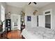 Bright bedroom features hardwood floors and deer decor at 1901 S Old State Road 67, Paragon, IN 46166