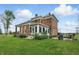 Beautiful brick home with a sunroom and well-maintained landscaping at 1901 S Old State Road 67, Paragon, IN 46166