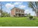 Spacious brick home featuring a large yard, porch, and mature trees at 1901 S Old State Road 67, Paragon, IN 46166
