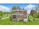 Exterior side angle of home showcasing a porch and a landscaped lawn at 1901 S Old State Road 67, Paragon, IN 46166