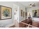 Hallway features hardwood floors and artwork at 1901 S Old State Road 67, Paragon, IN 46166