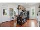 Charming kitchen featuring an island with a pot rack, hardwood floors, and stainless steel appliances at 1901 S Old State Road 67, Paragon, IN 46166