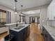 Stylish kitchen with granite countertops, stainless steel appliances, and an open layout connecting to the dining area at 270 W Broadway St, Shelbyville, IN 46176