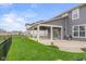 Enjoy a beautiful backyard with a covered patio, perfect for outdoor gatherings and relaxation at 2736 Victory Dr, Columbus, IN 47203
