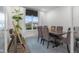 Formal dining room with large window, stylish chairs, and elegant decor creates a perfect setting at 2736 Victory Dr, Columbus, IN 47203