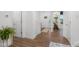 Bright hallway showcases clean design, wood floors, and a welcoming view of the home's interior at 2736 Victory Dr, Columbus, IN 47203