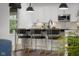 Stylish kitchen island with counter seating and modern pendant lighting at 2736 Victory Dr, Columbus, IN 47203