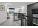 Open loft area with plush seating and stylish accents offers a versatile and inviting space at 2736 Victory Dr, Columbus, IN 47203