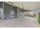 Spacious covered patio with ceiling fans, ideal for outdoor entertaining and relaxation at 2736 Victory Dr, Columbus, IN 47203