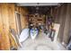 Well-organized garage with storage shelves and space for kayaks and a bicycle at 3004 Lake Shore Dr # E, Indianapolis, IN 46205