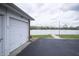 Garage exterior with a lake view at 3004 Lake Shore Dr # E, Indianapolis, IN 46205
