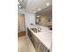 Renovated kitchen boasts marble countertops, stainless steel appliances, and sleek cabinetry at 3004 Lake Shore Dr # E, Indianapolis, IN 46205