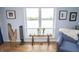 Cozy living room with plenty of natural light, hardwood floors, and comfortable furniture at 3004 Lake Shore Dr # E, Indianapolis, IN 46205