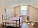 Cozy bedroom with natural light and playful decor at 323 E Adams St, Franklin, IN 46131