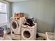Well-equipped laundry room with washer and dryer, plus utility sink at 323 E Adams St, Franklin, IN 46131