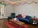 Cozy living room featuring hardwood floors and a comfortable seating area at 323 E Adams St, Franklin, IN 46131