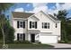 Charming two-story home featuring a classic design with white siding and black shutters at 3941 Highcrest Rd, Indianapolis, IN 46239