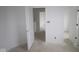 Hallway in unfinished home with fresh white paint and baseboards at 3941 Highcrest Rd, Indianapolis, IN 46239