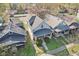 This aerial view showcases mature trees, a cozy porch, and a serene neighborhood setting at 422 N Oxford St, Indianapolis, IN 46201