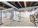 Spacious unfinished basement area with visible utilities and ample room for storage or renovation at 422 N Oxford St, Indianapolis, IN 46201
