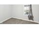 Well-lit bedroom with neutral walls and plush carpet perfect for relaxation at 422 N Oxford St, Indianapolis, IN 46201