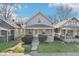 Inviting curb appeal with a well-maintained front yard, a covered porch, and classic design at 422 N Oxford St, Indianapolis, IN 46201