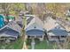 This home has a well-manicured front yard, classic porch, and inviting curb appeal at 422 N Oxford St, Indianapolis, IN 46201