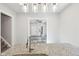 Kitchen island with granite countertops looks out to the home's interior at 422 N Oxford St, Indianapolis, IN 46201