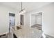 Bright kitchen features an island with granite countertops and stainless steel sink at 422 N Oxford St, Indianapolis, IN 46201