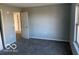 Bedroom with doorway and a closet with an open door showing the closet rod at 480 Village Blvd, Mooresville, IN 46158