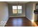 Bright dining room area features hardwood floors and lots of natural light at 480 Village Blvd, Mooresville, IN 46158