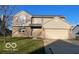 Charming two-story home featuring a two-car garage, brick accents, and well-maintained landscaping at 480 Village Blvd, Mooresville, IN 46158