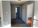 Hallway featuring neutral walls and carpet flooring at 480 Village Blvd, Mooresville, IN 46158