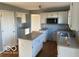 Kitchen equipped with a kitchen island and lots of cabinet space at 480 Village Blvd, Mooresville, IN 46158