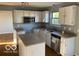 Functional kitchen with essential appliances and ample countertop space at 480 Village Blvd, Mooresville, IN 46158