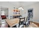 Charming dining area with a wooden table and comfortable seating, perfect for Gathering gatherings at 4815 Winthrop Ave, Indianapolis, IN 46205