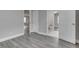 Bathroom featuring white marble floors and a toilet through the doorway from bedroom at 4945 Camden St, Indianapolis, IN 46227