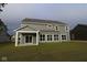 Backyard featuring a covered patio and ample windows to bring the outside in at 4952 Cinnabar Trl, Brownsburg, IN 46112