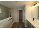 This bathroom features modern fixtures and finishes with an opening to the closet at 4952 Cinnabar Trl, Brownsburg, IN 46112