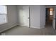 This bedroom has neutral walls and carpet with a door to the closet at 4952 Cinnabar Trl, Brownsburg, IN 46112
