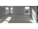 Bedroom space with large windows providing ample sunlight, neutral walls, and clean design at 4952 Cinnabar Trl, Brownsburg, IN 46112