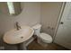 Bathroom with white vanity sink, toilet, and white trim, and brushed nickle hardware at 4960 Cinnabar Trl, Brownsburg, IN 46112