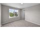 Inviting bedroom featuring a large window with scenic views, creating a serene space at 4960 Cinnabar Trl, Brownsburg, IN 46112