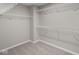Walk-in closet featuring neutral walls, carpet flooring, and white wire shelving at 4960 Cinnabar Trl, Brownsburg, IN 46112