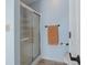 Bathroom featuring a glass door shower, tile flooring, and a neutral colored towel at 5312 Ripplingbrook Way, Carmel, IN 46033