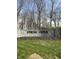Stone sign for the Spring Creek community entrance with landscaping at 5312 Ripplingbrook Way, Carmel, IN 46033