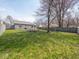 Beautiful backyard featuring a fire pit, great for entertaining friends and Gathering at 5512 Straw Hat Dr, Indianapolis, IN 46237