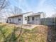 Nice backyard patio with table and chairs offering a space for outdoor relaxation and dining at 5512 Straw Hat Dr, Indianapolis, IN 46237