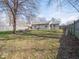 Large backyard with a fire pit, perfect for outdoor gatherings and relaxation at 5512 Straw Hat Dr, Indianapolis, IN 46237
