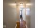 A hallway with wood floors leading to a bedroom at 5512 Straw Hat Dr, Indianapolis, IN 46237